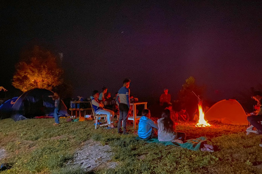 enjoying campfire at buntod campground